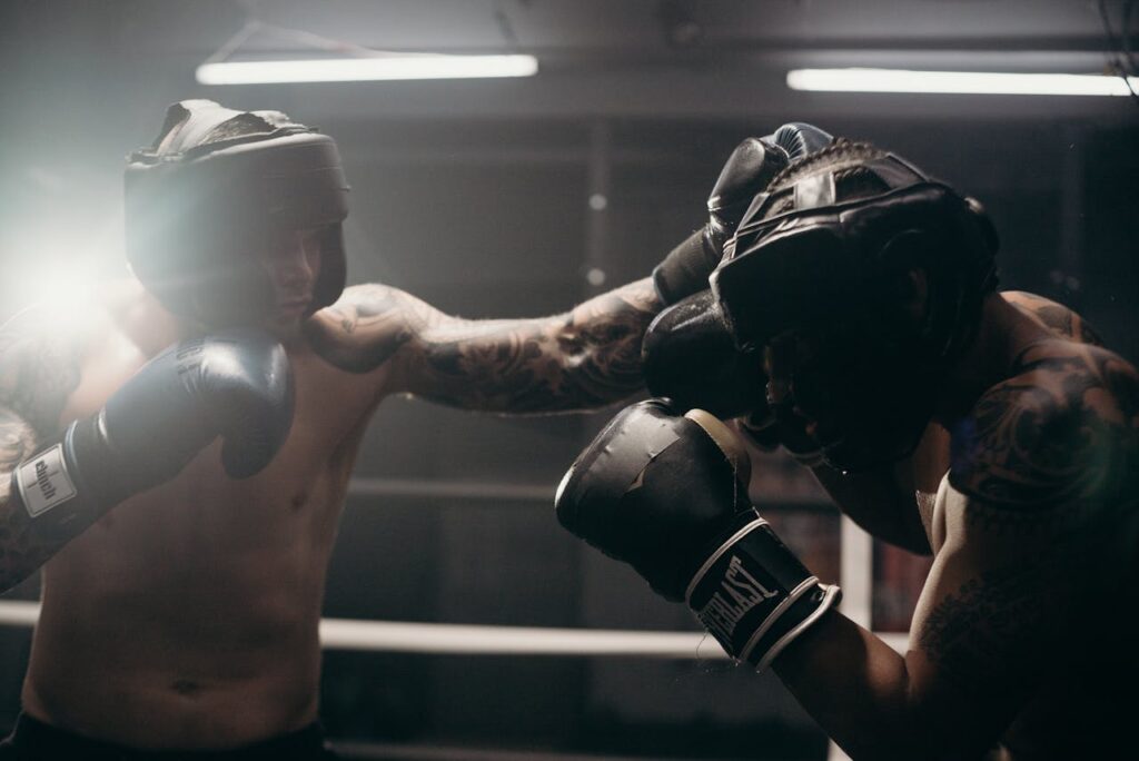 Man in Black Boxing Gloves